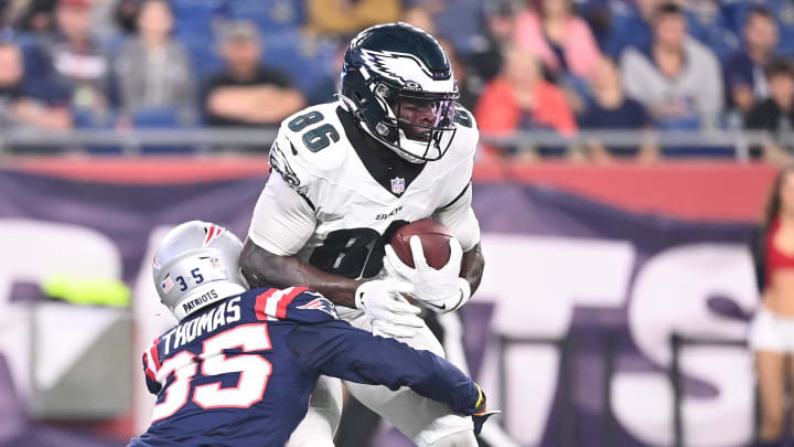 Aug 15, 2024; Foxborough, MA, USA; Philadelphia Eagles wide receiver Joseph Ngata (86) is tackled by New England Patriots safety A.J. Thomas (35) during the second half at Gillette Stadium. Mandatory Credit.
