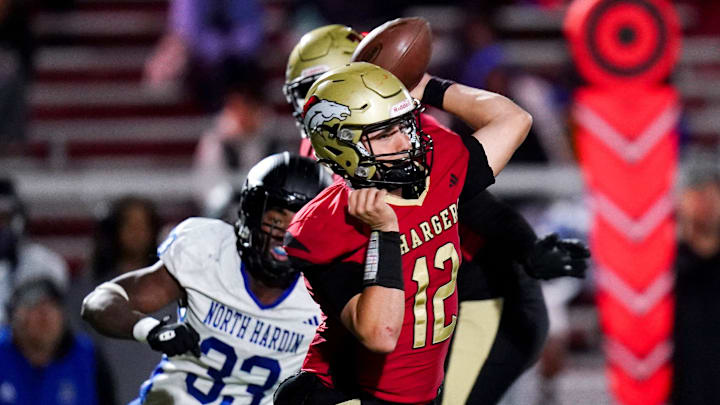 Bullitt East Charger throws a pass in the second half of a high school football game between the Bullitt East Chargers and North Hardin Trojans, Thursday, Nov. 6, 2025, at Bullitt East High School Stadium. Chargers won 28-21.