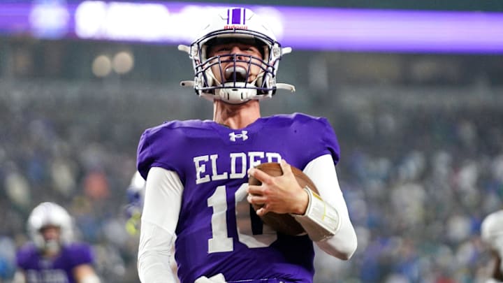 Elder Panthers quarterback celebrates after scoring a touchdown in the first half of Division I regional final high school football game between the Elder Panthers and St. Xavier Bombers, Friday, Nov. 21, 2025, at Paycor Stadium in downtown Cincinnati. Elder Panthers quarterback celebrates after scoring a touchdown in the first half of Division I regional final high school football game between the Elder Panthers and St. Xavier Bombers, Friday, Nov. 21, 2025, at Paycor Stadium in downtown Cincinnati.