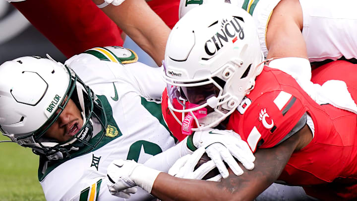 Cincinnati Bearcats running back Evan Pryor (6) scores a touchdown in the first quarter of a NCAA men’s football game between the Cincinnati Bearcats and Baylor Bears, Saturday, Oct. 25, 2025, at Nippert Stadium in Cincinnati. Cincinnati Bearcats running back Evan Pryor (6) scores a touchdown in the first quarter of a NCAA men’s football game between the Cincinnati Bearcats and Baylor Bears, Saturday, Oct. 25, 2025, at Nippert Stadium in Cincinnati.