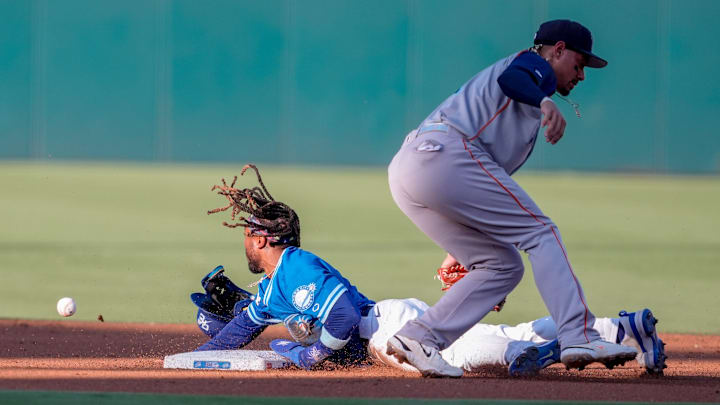 Oklahoma City outfielder Justin Dean (3) steals second base past Sugar Land infielder Edwin Díaz (31) during a minor league baseball game between the Oklahoma City Comets and the Sugar Land Space Cowboys at Chickasaw Bricktown Ballpark in Oklahoma City, on July 10.