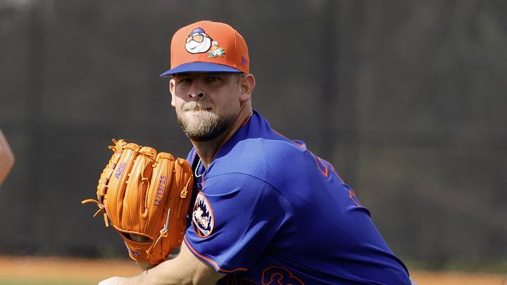Feb 18, 2026; Port St. Lucie, FL, USA;  tNew York Mets pitcher A.J. Minter (33) hrows a pitch during spring training workouts at Clover Park. Mandatory Credit: Reinhold Matay-Imagn Images