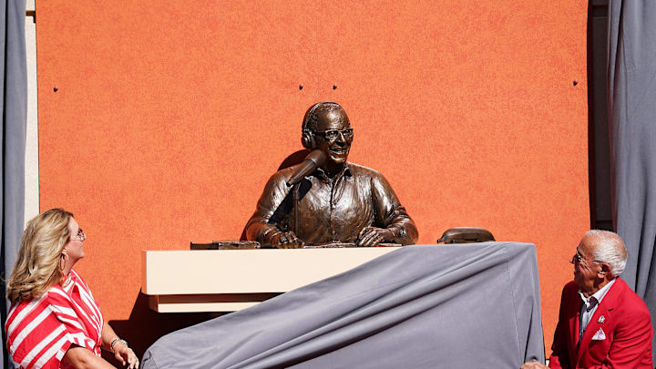Amanda and Marty Brennaman unveil the bronze statue of Marty at Crosley Terrace, Saturday, Sept. 6, 2025, at Great American Ball Park in downtown Cincinnati. Amanda and Marty Brennaman unveil the bronze statue of Marty at Crosley Terrace, Saturday, Sept. 6, 2025, at Great American Ball Park in downtown Cincinnati.