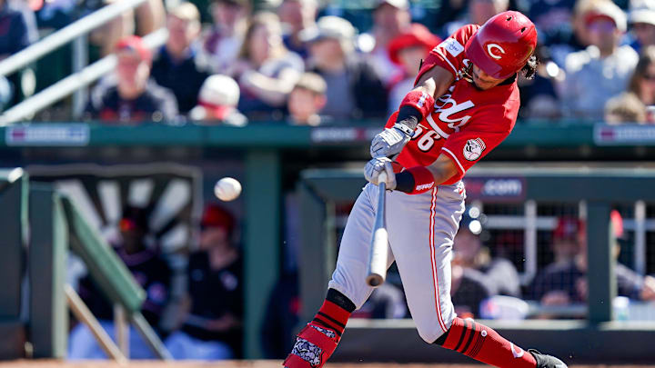 Cincinnati Reds shortstop Edwin Arroyo (56) hits the ball in the third inning of a Cactus League game between the Cincinnati Reds and Cleveland Guardians, Saturday, Feb. 21, 2026, at Goodyear Ballpark in Goodyear, Ariz.
