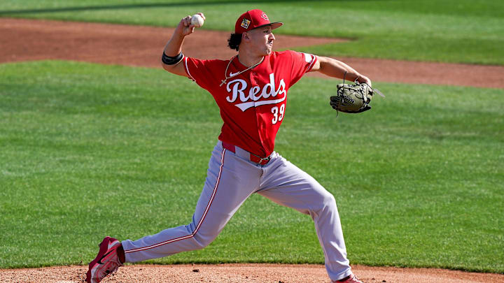 Cincinnati Reds pitcher Julian Aguiar (39) throws a pitch during a live batting practice, Sunday, Feb. 15, 2026, at the Cincinnati Reds player development complex in Goodyear, Ariz.