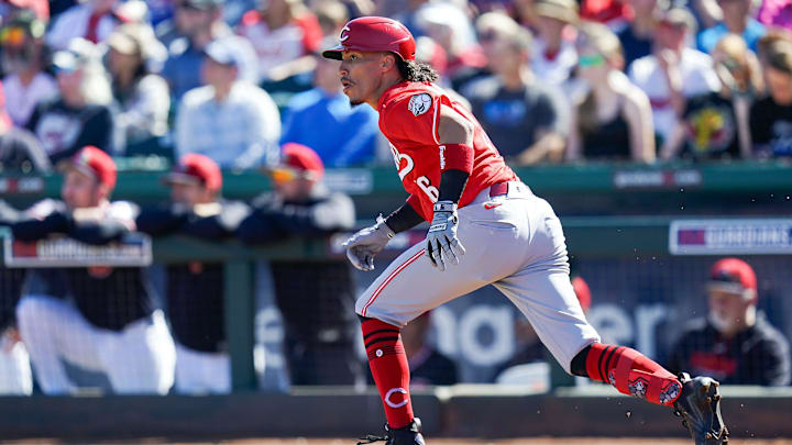 Cincinnati Reds shortstop Edwin Arroyo (56) runs for first base in the third inning of a Cactus League game between the Cincinnati Reds and Cleveland Guardians, Saturday, Feb. 21, 2026, at Goodyear Ballpark in Goodyear, Ariz.