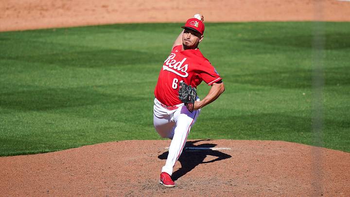 Cincinnati Reds pitcher Julian Garcia (61) throws a pitch in the fifth inning of a Cactus League game between the Cincinnati Reds and Seattle Mariners, Sunday, Feb. 22, 2026, at Goodyear Ballpark in Goodyear, Ariz. Cincinnati Reds pitcher Julian Garcia (61) throws a pitch in the fifth inning of a Cactus League game between the Cincinnati Reds and Seattle Mariners, Sunday, Feb. 22, 2026, at Goodyear Ballpark in Goodyear, Ariz.