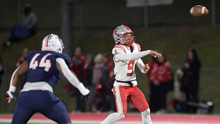 Saraland's Karle Lacey, Jr., passes against Pike Road during their AHSAA football playoff game Saraland's Karle Lacey, Jr., passes against Pike Road during their AHSAA football playoff game