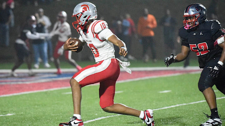 Saraland's Jamison Roberts (10) scrambles for a touchdown against Pike Road during their AHSAA football playoff game in Pike Road, Ala., on Friday November 21, 2025.