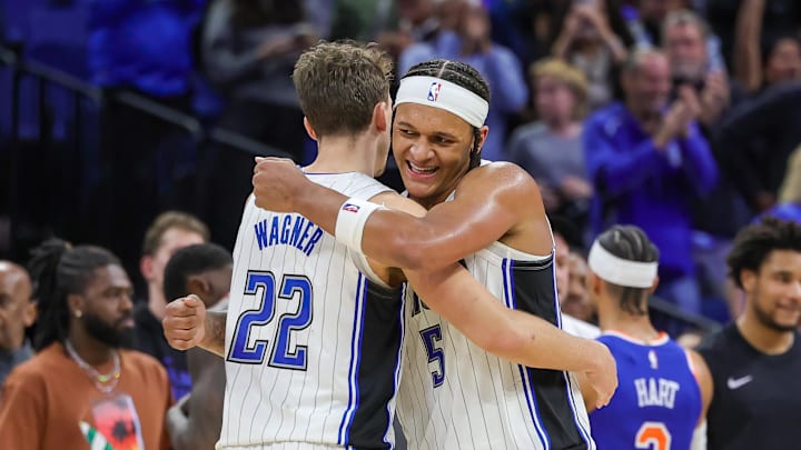 Dec 29, 2023; Orlando, Florida, USA; Orlando Magic forward Franz Wagner (22) and forward Paolo Banchero (5) celebrate their 117-108 win against the New York Knicks at KIA Center. Mandatory Credit: Mike Watters-Imagn Images Dec 29, 2023; Orlando, Florida, USA; Orlando Magic forward Franz Wagner (22) and forward Paolo Banchero (5) celebrate their 117-108 win against the New York Knicks at KIA Center. Mandatory Credit: Mike Watters-Imagn Images