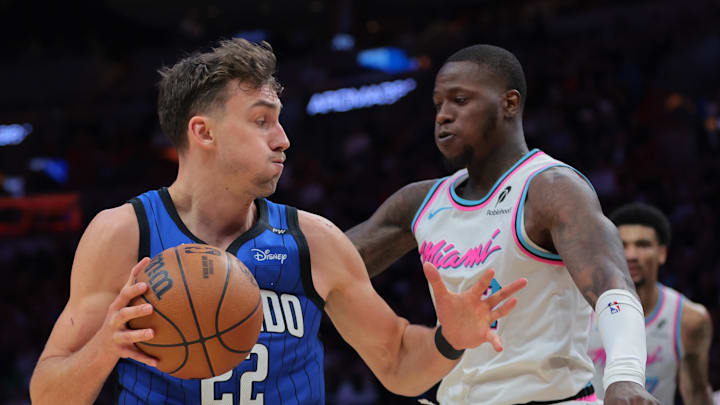 Orlando Magic forward Franz Wagner drives to the basket against Miami Heat guard Terry Rozier. Orlando Magic forward Franz Wagner drives to the basket against Miami Heat guard Terry Rozier.