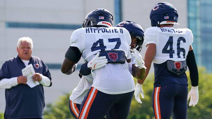Chicago Bears linebacker Nephi Sewell (45) tackles linebacker Ruben Hyppolite II (47) during drills at a joint training camp at the Kettering Health Practice Fields, Thursday, Aug. 20, 2026, in downtown Cincinnati.