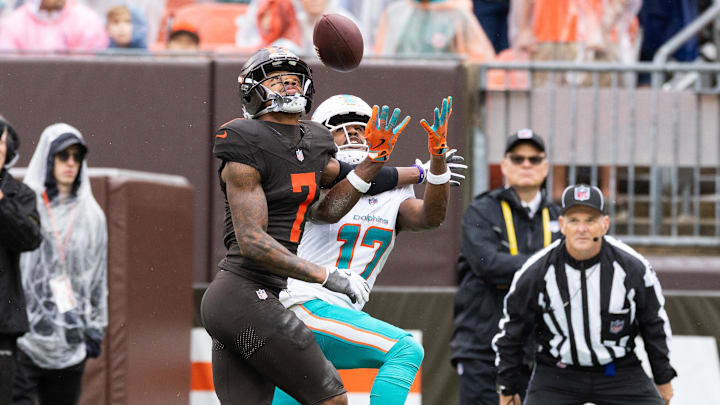 Oct 19, 2025; Cleveland, Ohio, USA;  Cleveland Browns cornerback Tyson Campbell (7) breaks up a pass intended for Miami Dolphins wide receiver Jaylen Waddle (17) during the second quarter at Huntington Bank Field. Mandatory Credit: Scott Galvin-Imagn Images