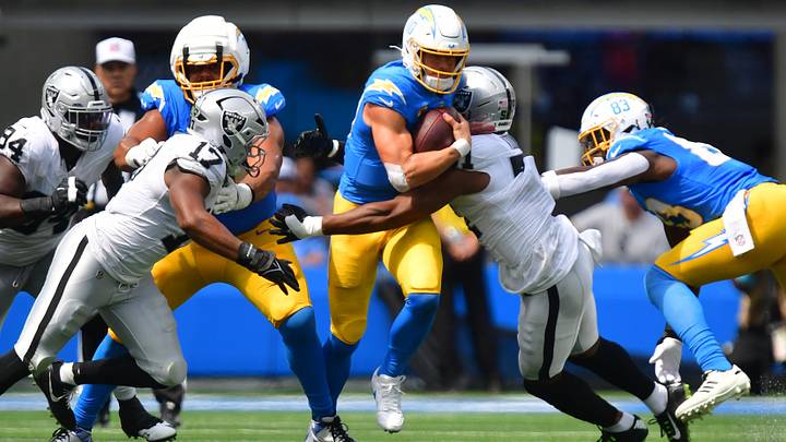 Sep 20, 2026; Inglewood, California, USA; Los Angeles Chargers quarterback Justin Herbert (10) is pressured by Las Vegas Raiders defensive end Malcolm Koonce (51) during the first half at SoFi Stadium. Mandatory Credit: Gary A. Vasquez-Imagn Images Sep 20, 2026; Inglewood, California, USA; Los Angeles Chargers quarterback Justin Herbert (10) is pressured by Las Vegas Raiders defensive end Malcolm Koonce (51) during the first half at SoFi Stadium. Mandatory Credit: Gary A. Vasquez-Imagn Images