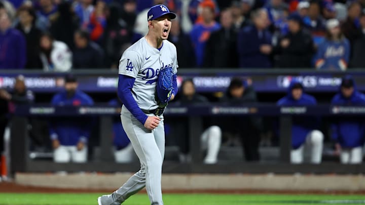 Oct 16, 2024; New York City, New York, USA; Los Angeles Dodgers pitcher Walker Buehler (21) reacts after an out against the New York Mets in the second inning during Game 3 of the NLCS for the 2024 MLB playoffs at Citi Field.