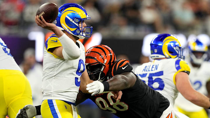 Los Angeles Rams quarterback Matthew Stafford (9) is hit as he throws by Cincinnati Bengals nose tackle D.J. Reader (98) in the third quarter during Super Bowl 56, Sunday, Feb. 13, 2022, at SoFi Stadium in Inglewood, Calif. The Cincinnati Bengals lost, 23-20. Los Angeles Rams quarterback Matthew Stafford (9) is hit as he throws by Cincinnati Bengals nose tackle D.J. Reader (98) in the third quarter during Super Bowl 56, Sunday, Feb. 13, 2022, at SoFi Stadium in Inglewood, Calif. The Cincinnati Bengals lost, 23-20.