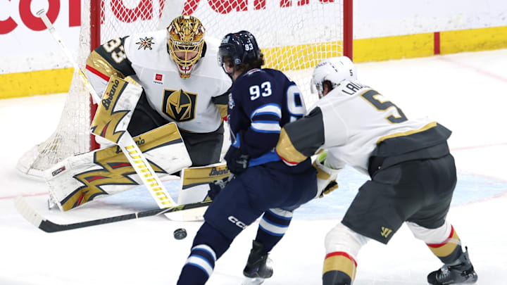 Mar 24, 2026; Winnipeg, Manitoba, CAN; Winnipeg Jets center Brad Lambert (93) shoots on Vegas Golden Knights goaltender Adin Hill (33) in the third period at Canada Life Centre. Mandatory Credit: James Carey Lauder-Imagn Images Mar 24, 2026; Winnipeg, Manitoba, CAN; Winnipeg Jets center Brad Lambert (93) shoots on Vegas Golden Knights goaltender Adin Hill (33) in the third period at Canada Life Centre. Mandatory Credit: James Carey Lauder-Imagn Images