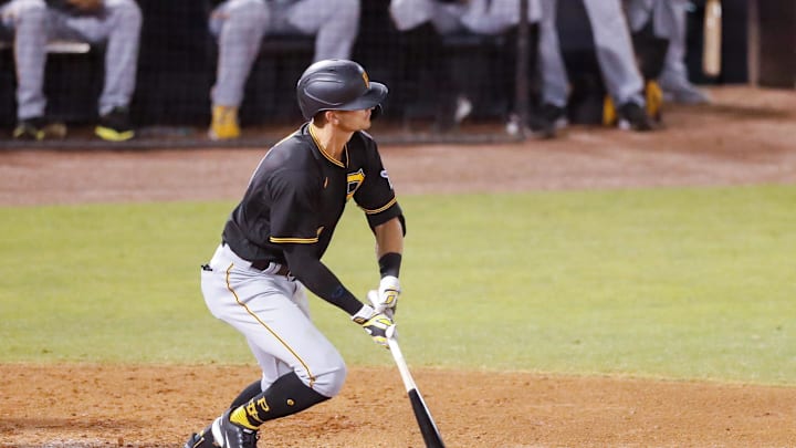 Mar 10, 2021; Tampa, Florida, USA; Pittsburgh Pirates right fielder Jared Oliva (14) looks up after hitting a home run in the sixth inning during spring training at George M. Steinbrenner Field. Mandatory Credit: Nathan Ray Seebeck-Imagn Images Mar 10, 2021; Tampa, Florida, USA; Pittsburgh Pirates right fielder Jared Oliva (14) looks up after hitting a home run in the sixth inning during spring training at George M. Steinbrenner Field. Mandatory Credit: Nathan Ray Seebeck-Imagn Images