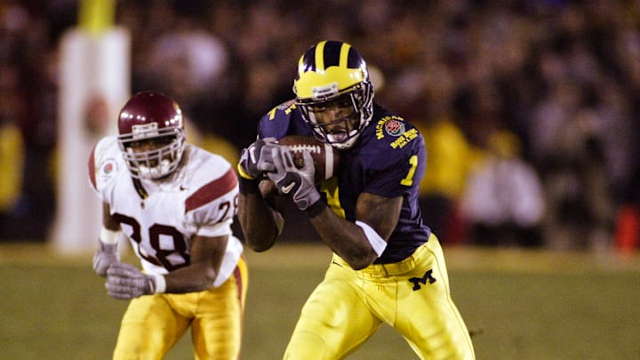 Jan 1, 2004; Pasadena, CA, USA: FILE PHOTO; Michigan Wolverines wide receiver Braylon Edwards (1) in action against the Southern California Trojans during the 2004 Rose Bowl at the Rose Bowl. The Trojans defeated the Wolverines 28-14. Mandatory Credit: Richard Mackson-USA TODAY Network Jan 1, 2004; Pasadena, CA, USA: FILE PHOTO; Michigan Wolverines wide receiver Braylon Edwards (1) in action against the Southern California Trojans during the 2004 Rose Bowl at the Rose Bowl. The Trojans defeated the Wolverines 28-14. Mandatory Credit: Richard Mackson-USA TODAY Network