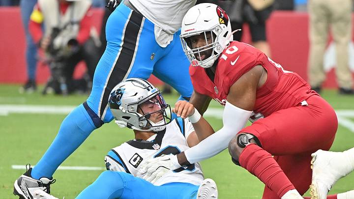 Sep 14, 2025; Glendale, Arizona, USA; Arizona Cardinals linebacker Josh Sweat (10) tackles Carolina Panthers quarterback Bryce Young (9) during the first quarter at State Farm Stadium. Mandatory Credit: Matt Kartozian-Imagn Images Sep 14, 2025; Glendale, Arizona, USA; Arizona Cardinals linebacker Josh Sweat (10) tackles Carolina Panthers quarterback Bryce Young (9) during the first quarter at State Farm Stadium. Mandatory Credit: Matt Kartozian-Imagn Images