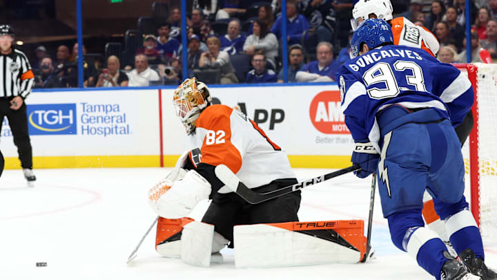 Nov 7, 2024; Tampa, Florida, USA; Philadelphia Flyers goaltender Ivan Fedotov (82) makes a save against the Tampa Bay Lightning during the first period at Amalie Arena.