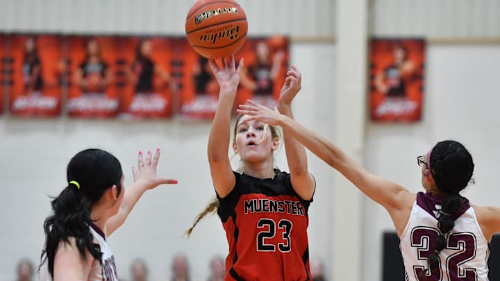 Muenster's Emma Grewing shoots the ball during a playoff game against Seymour on Monday, February 17, 2025, at Burkburnett High School.