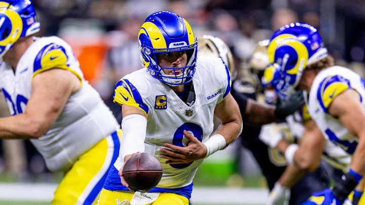 Dec 1, 2024; New Orleans, Louisiana, USA;  Los Angeles Rams quarterback Matthew Stafford (9) drops back to pass against the New Orleans Saints during the second half at Caesars Superdome. Mandatory Credit: Stephen Lew-Imagn Images