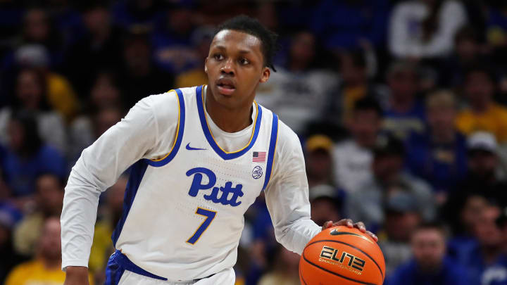 Mar 9, 2024; Pittsburgh, Pennsylvania, USA;  Pittsburgh Panthers guard Carlton Carrington (7) brings