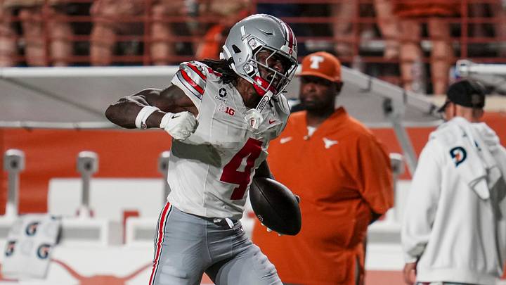 Ohio State Buckeyes wide receiver Jeremiah Smith (4) reacts after making a catch during the NCAA football game against the Texas Longhorns at Darrell K Royal–Texas Memorial Stadium in Austin, Texas on Sept. 12, 2026. Ohio State Buckeyes wide receiver Jeremiah Smith (4) reacts after making a catch during the NCAA football game against the Texas Longhorns at Darrell K Royal–Texas Memorial Stadium in Austin, Texas on Sept. 12, 2026.