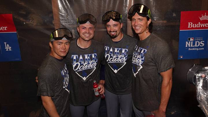 Oct 7, 2026; Cumberland, Georgia, USA;  Left to right: Los Angeles Dodgers pitcher Yoshinobu Yamamoto (18), pitcher Tarik Skubal (29), pitcher Blake Snell (7), and pitcher Tyler Glasnow (31), celebrate in the locker room after defeating the Atlanta Braves in game four of the NLDS for the 2026 MLB Playoffs at Truist Park.  Mandatory Credit: Dale Zanine-Imagn Images