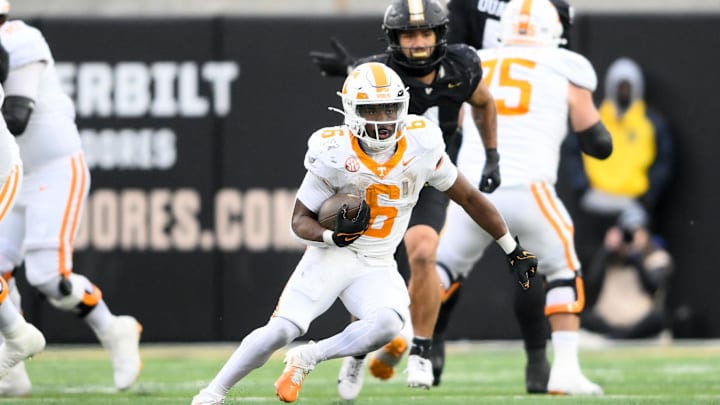 Nov 30, 2024; Nashville, Tennessee, USA;  Tennessee Volunteers running back Dylan Sampson (6) runs the ball against the Vanderbilt Commodores during the second half at FirstBank Stadium. Mandatory Credit: Steve Roberts-Imagn Images