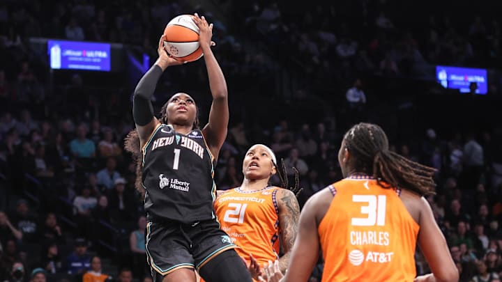 May 9, 2025; Brooklyn, NY, USA; New York Marquesha Davis (1) drives past Connecticut Sun guard Marina Mabrey (3) and forward Robyn Parks (21) in the second quarter at Barclays Center. Mandatory Credit: Wendell Cruz-Imagn Images May 9, 2025; Brooklyn, NY, USA; New York Marquesha Davis (1) drives past Connecticut Sun guard Marina Mabrey (3) and forward Robyn Parks (21) in the second quarter at Barclays Center. Mandatory Credit: Wendell Cruz-Imagn Images