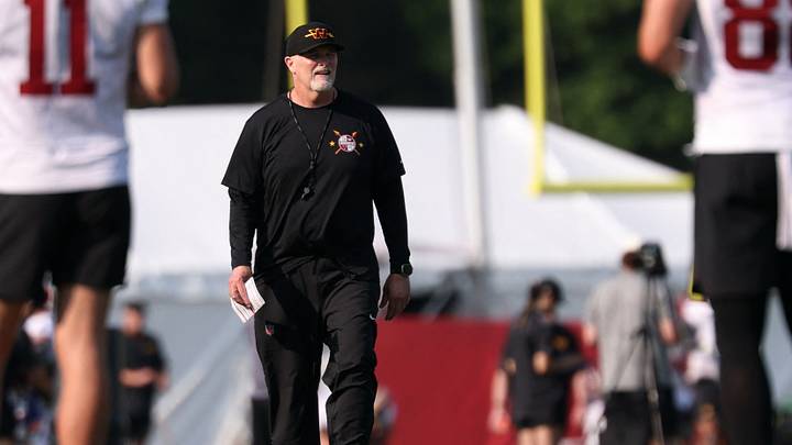 Jul 29, 2026; Ashburn, VA, USA; Washington Commanders head coach Dan Quinn walks on the field on day one of training camp at BigBear.ai Performance Center at Commanders Park. Mandatory Credit: Geoff Burke-Imagn Images Jul 29, 2026; Ashburn, VA, USA; Washington Commanders head coach Dan Quinn walks on the field on day one of training camp at BigBear.ai Performance Center at Commanders Park. Mandatory Credit: Geoff Burke-Imagn Images