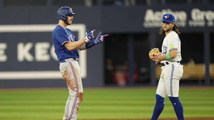 Sep 11, 2023; Toronto, Ontario, CAN; Texas Rangers Catcher Jonah Heim (28) celebrates his RBI double in the 6th