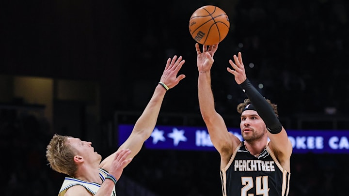 Jan 19, 2026; Atlanta, Georgia, USA; Atlanta Hawks forward Corey Kispert (24) attempts a shot against Milwaukee Bucks guard AJ Green (20) during the first quarter at State Farm Arena. Mandatory Credit: Jordan Godfree-Imagn Images Jan 19, 2026; Atlanta, Georgia, USA; Atlanta Hawks forward Corey Kispert (24) attempts a shot against Milwaukee Bucks guard AJ Green (20) during the first quarter at State Farm Arena. Mandatory Credit: Jordan Godfree-Imagn Images