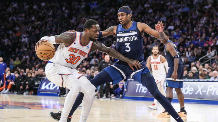 Jan 1, 2024; New York, New York, USA; New York Knicks forward Julius Randle (30) looks to drive past Minnesota Timberwolves forward Jaden McDaniels (3) in the fourth quarter at Madison Square Garden. Mandatory Credit: Wendell Cruz-USA TODAY Sports Jan 1, 2024; New York, New York, USA; New York Knicks forward Julius Randle (30) looks to drive past Minnesota Timberwolves forward Jaden McDaniels (3) in the fourth quarter at Madison Square Garden. Mandatory Credit: Wendell Cruz-USA TODAY Sports