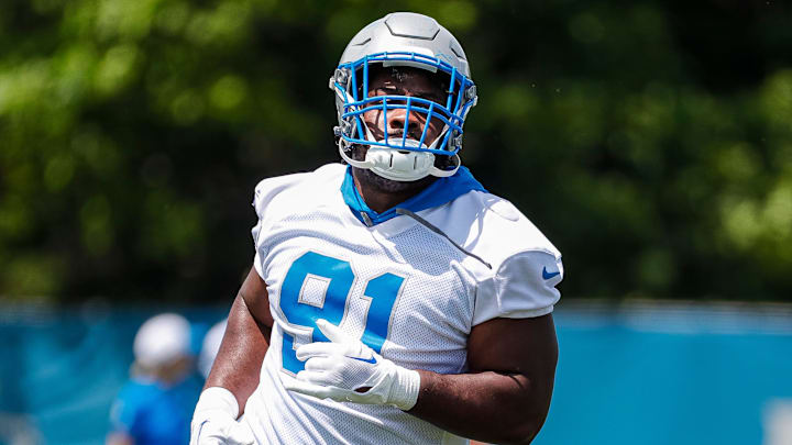 Detroit Lions defensive end Levi Onwuzurike (91) practices during mini camp at Detroit Lions headquarters and practice facility in Allen Park on Tuesday, June 4, 2024.