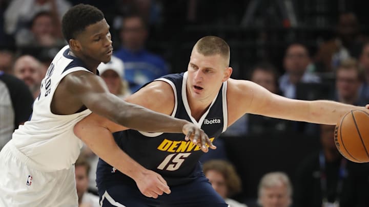 May 12, 2024; Minneapolis, Minnesota, USA; Denver Nuggets center Nikola Jokic (15) works around