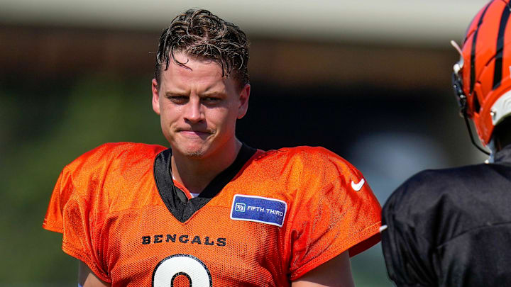 Cincinnati Bengals quarterback Joe Burrow (9) sets up between plays during a preseason training camp practice in downtown Cincinnati on Wednesday, July 30, 2025.