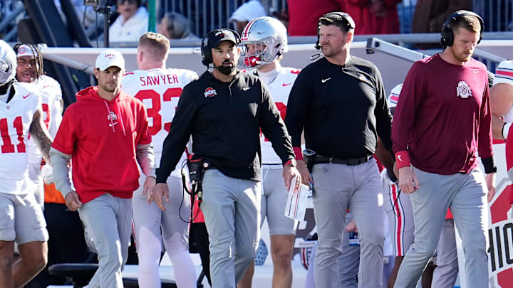 Ohio State Buckeyes head coach Ryan Day walks up the sideline beside offensive line coach Justin Frye during the second half of the NCAA football game against the Penn State Nittany Lions at Beaver Stadium in University Park, Pa. on Saturday, Nov. 2, 2024. Ohio State won 20-13.