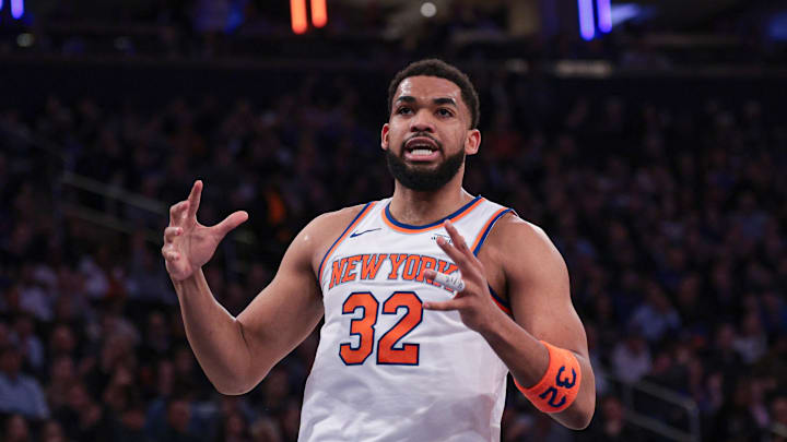 Feb 19, 2026; New York, New York, USA; New York Knicks center Karl-Anthony Towns (32) reacts during the first half against Detroit Pistons at Madison Square Garden. Mandatory Credit: Vincent Carchietta-Imagn Images