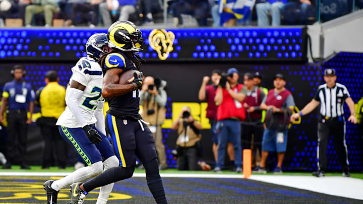 Nov 16, 2025; Inglewood, California, USA; Los Angeles Rams wide receiver Davante Adams (17) scores a touchdown during the first half against the Seattle Seahawks at SoFi Stadium. Mandatory Credit: Gary A. Vasquez-Imagn Images