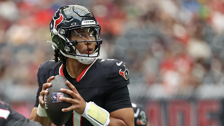 Aug 17, 2024; Houston, Texas, USA; Houston Texans quarterback C.J. Stroud (7) drops back to pass against the New York Giants in the first quarter at NRG Stadium. Mandatory Credit: Thomas Shea-Imagn Images Aug 17, 2024; Houston, Texas, USA; Houston Texans quarterback C.J. Stroud (7) drops back to pass against the New York Giants in the first quarter at NRG Stadium. Mandatory Credit: Thomas Shea-Imagn Images