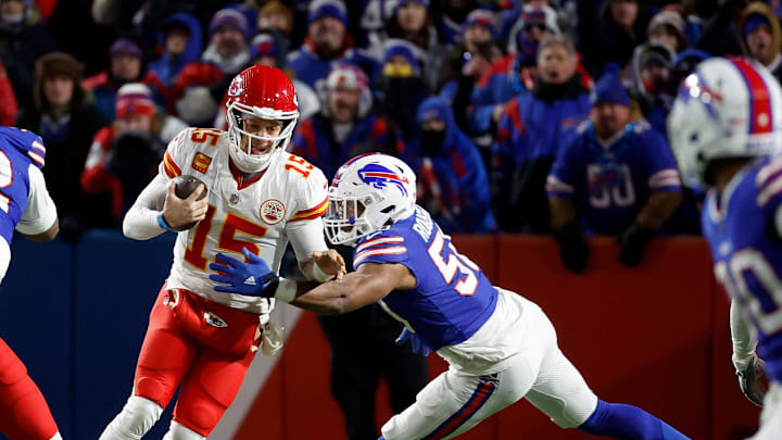 Kansas City Chiefs quarterback Patrick Mahomes (15) is pressured by Buffalo Bills defensive end Greg