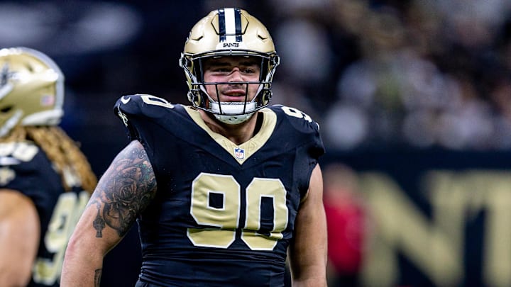 Dec 29, 2024; New Orleans, Louisiana, USA;  New Orleans Saints defensive tackle Bryan Bresee (90) reacts to making a tackle against the Las Vegas Raiders during the first half at Caesars Superdome. 