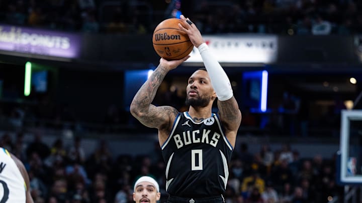 Dec 31, 2024; Indianapolis, Indiana, USA; Milwaukee Bucks guard Damian Lillard (0) shoots the ball  in the second half against the Indiana Pacers at Gainbridge Fieldhouse. Mandatory Credit: Trevor Ruszkowski-Imagn Images