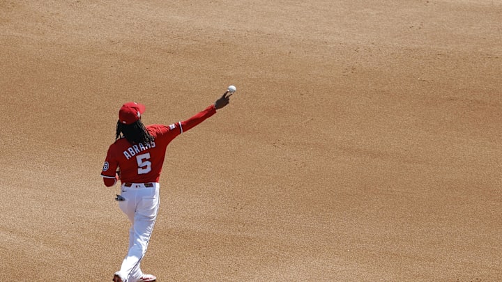 Sep 14, 2025; Washington, District of Columbia, USA; Washington Nationals shortstop CJ Abrams (5) makes a throwing error on a throw to first base on a ground ball by Pittsburgh Pirates second base Nick Yorke (not pictured) during the seventh inning at Nationals Park. Sep 14, 2025; Washington, District of Columbia, USA; Washington Nationals shortstop CJ Abrams (5) makes a throwing error on a throw to first base on a ground ball by Pittsburgh Pirates second base Nick Yorke (not pictured) during the seventh inning at Nationals Park.