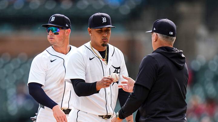 Detroit Tigers pitcher Keider Montero hands the ball to manager A.J. Hinch for a pitching change.