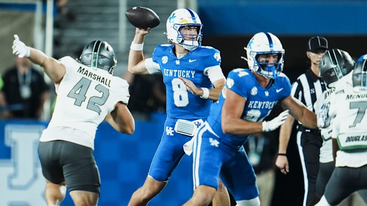 Kentucky Wildcats quarterback Cutter Boley (8) makes a throw in the first quarter as the Wildcats play Eastern Michigan at Kroger Field in Lexington, Kentucky Saturday, Sept. 13, 2025.