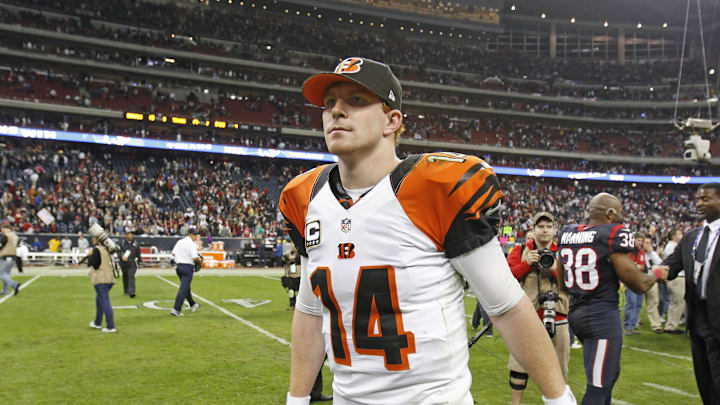 Andy Dalton leaves the field following the Bengals loss to the Houston Texans in the first round game of the AFC playoffs on Saturday Jan. 5, 2013.
Gl Bengals Texans 16 Andy Dalton leaves the field following the Bengals loss to the Houston Texans in the first round game of the AFC playoffs on Saturday Jan. 5, 2013.
Gl Bengals Texans 16